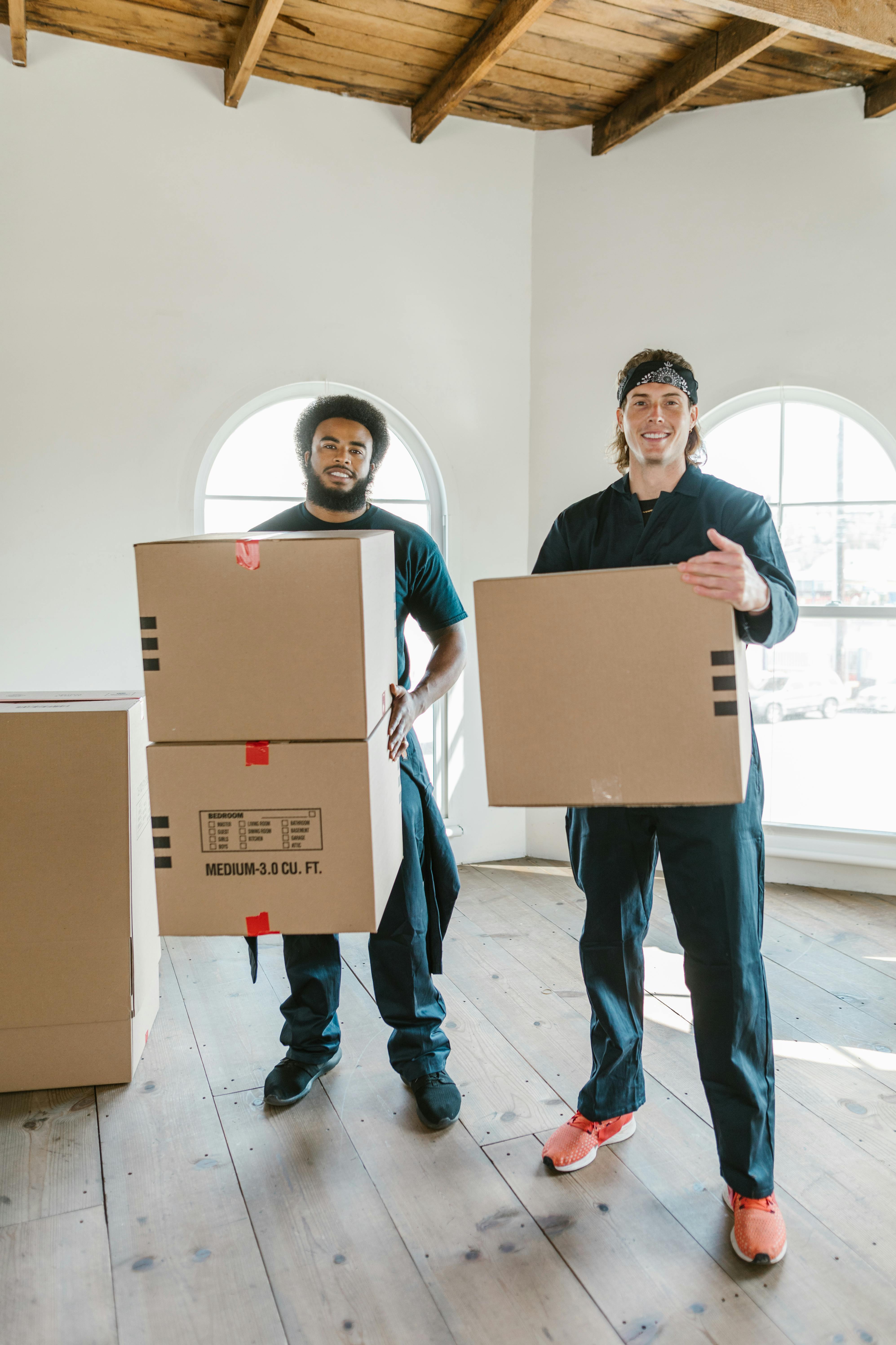 Apartment movers in Austin TX maneuvering through a complex